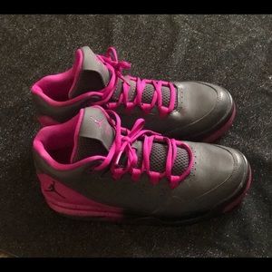 1 pair of purple and grey Jordans. Size 4 in kids.